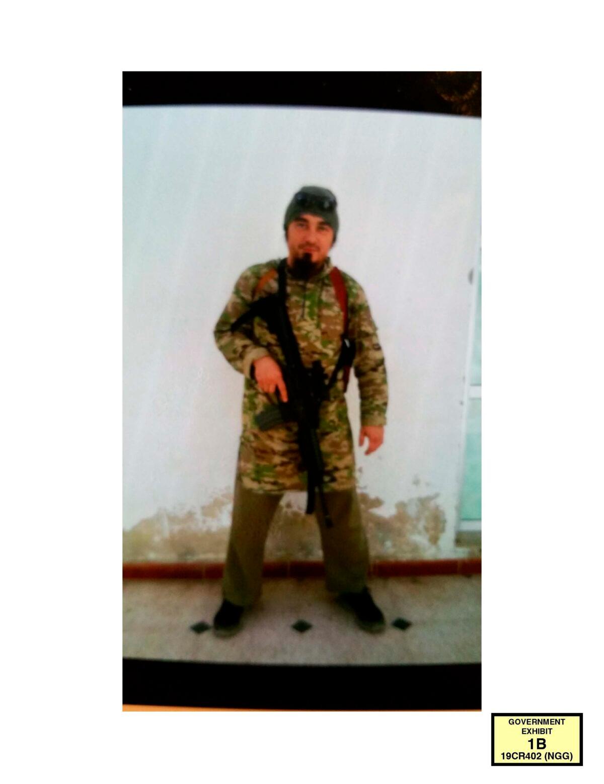 A man prosecutors say is Ruslan Maratovich Asainov in Tabqa, Syria, between June 2014 and April 2015. (U.S. Attorney's Office for the Eastern District of New York via AP)