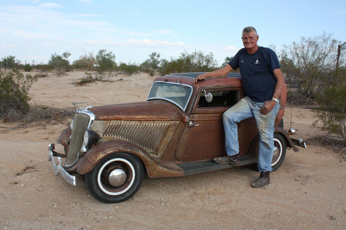 Adams and his ’34 Ford sedan, his personal favorite. (Courtesy of <a href="https://www.dwarfcarpromotions.com/">Ernie Adams</a>)
