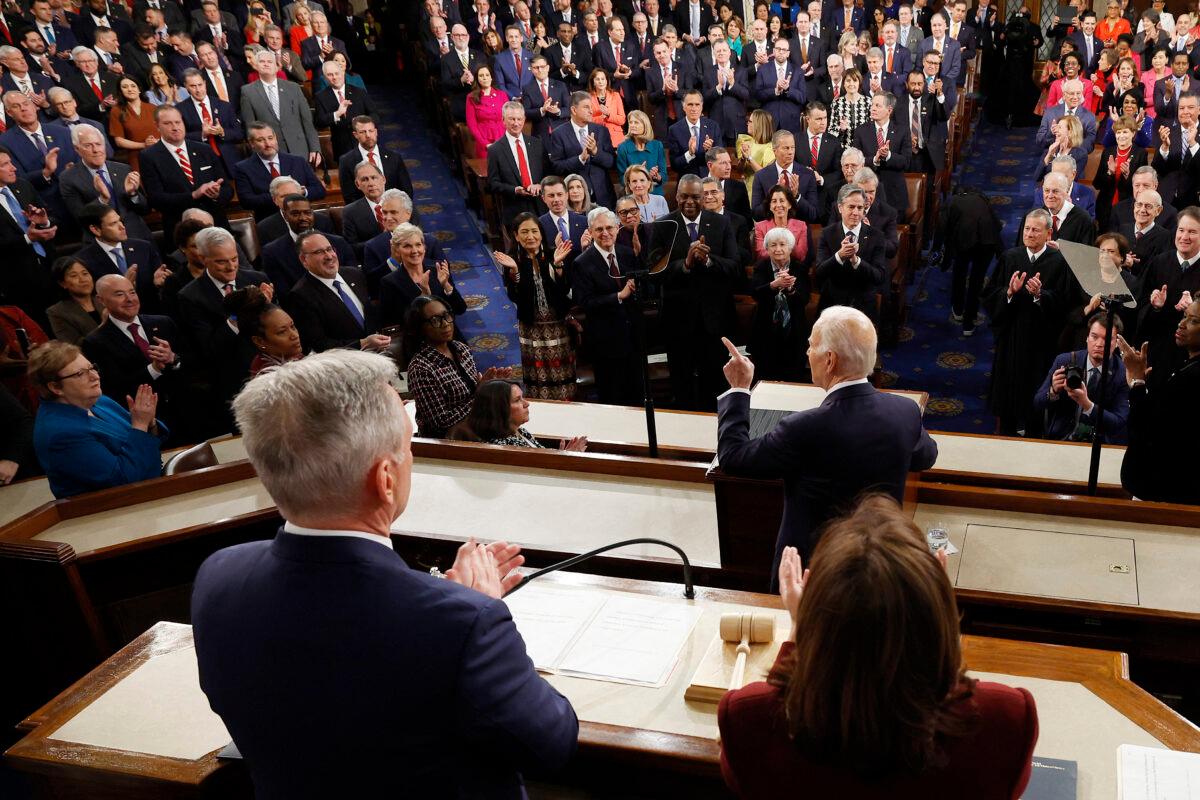 U.S. Vice President Kamala Harris (R) and U.S. Speaker of the House Kevin McCarthy (R-Calif.) listen as U.S. President Joe Biden delivers the State of the Union address in the House Chamber of the U.S. Capitol in Washington on Feb. 7, 2023. (Kevin Dietsch/AFP via Getty Images)