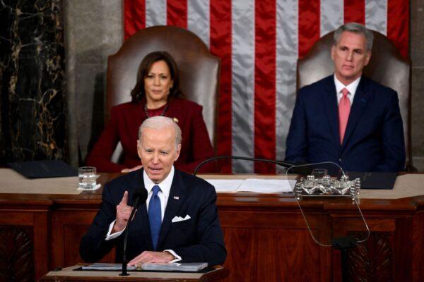 U.S. Vice President Kamala Harris and U.S. Speaker of the House Kevin McCarthy (R-CA) listen as U.S. President Joe Biden delivers the State of the Union address in the House Chamber of the U.S. Capitol in Washington on Feb. 7, 2023. (Saul Loeb/AFP via Getty Images)