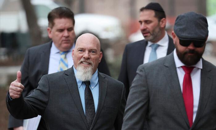 Richard "Bigo" Barnett (2nd L) arrives at the U.S. Courthouse on Jan. 10, 2023, for jury selection in his trial on eight Jan. 6, 2021, charges. (Win McNamee/Getty Images)