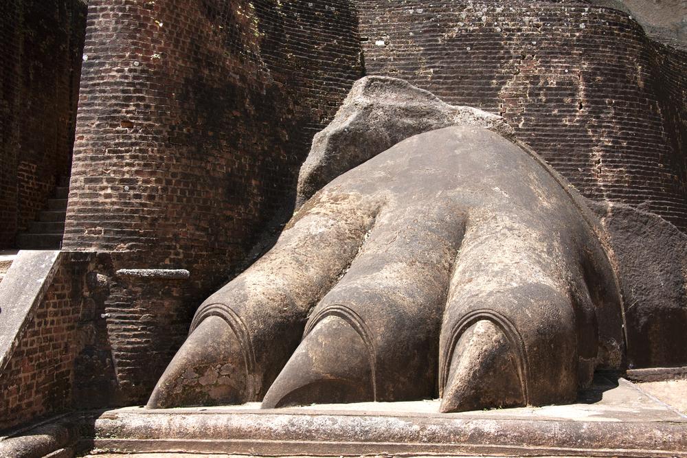The carved feet are all that remain of the Lion Rock statue. (Jane Rix/Shutterstock)