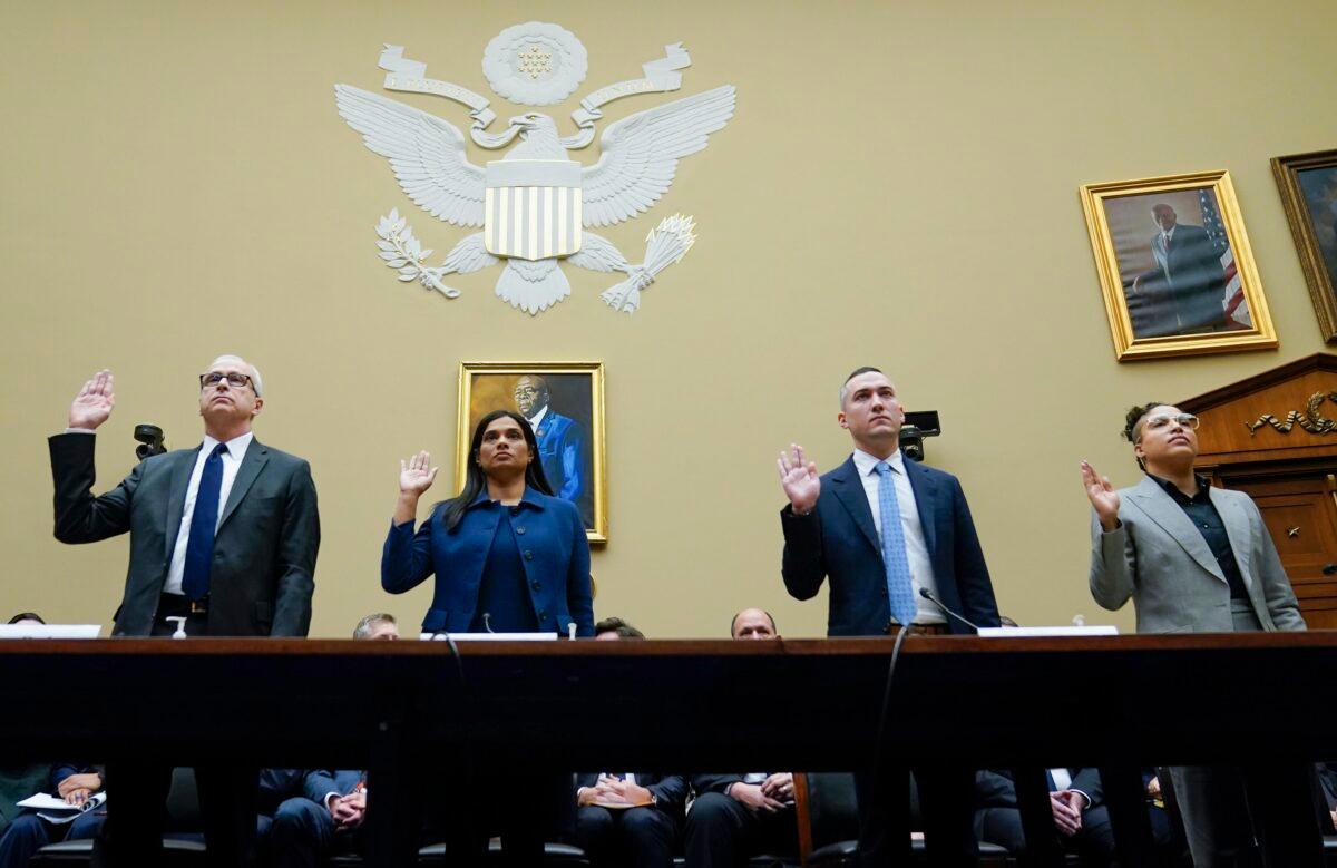 From left, James Baker, former deputy general counsel of Twitter; Vijaya Gadde, former chief legal officer of Twitter; Yoel Roth, former global head of trust and safety of Twitter; and former Twitter employee Anika Collier Navaroli are sworn in to testify during a House Committee on Oversight and Accountability hearing in Washington on Feb. 8, 2023. (Carolyn Kaster/AP Photo)