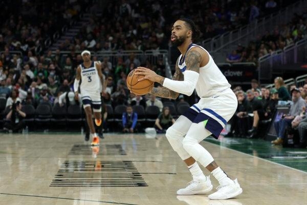 D'Angelo Russell (0) of the Minnesota Timberwolves takes a three point shot during a game against the Milwaukee Bucks at Fiserv Forum in Milwaukee on Dec. 30, 2022. (Stacy Revere/Getty Images)