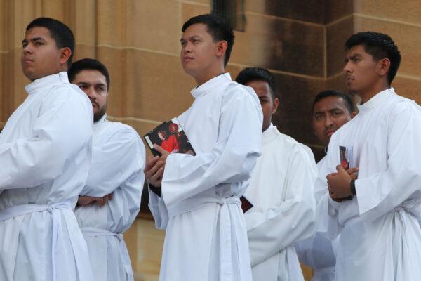 Members of the clergy gather outside St. Mary’s Cathedral ahead of the pontifical requiem Mass for Cardinal George Pell in Sydney, Australia, on Feb. 2, 2023. (Lisa Maree Williams/Getty Images)