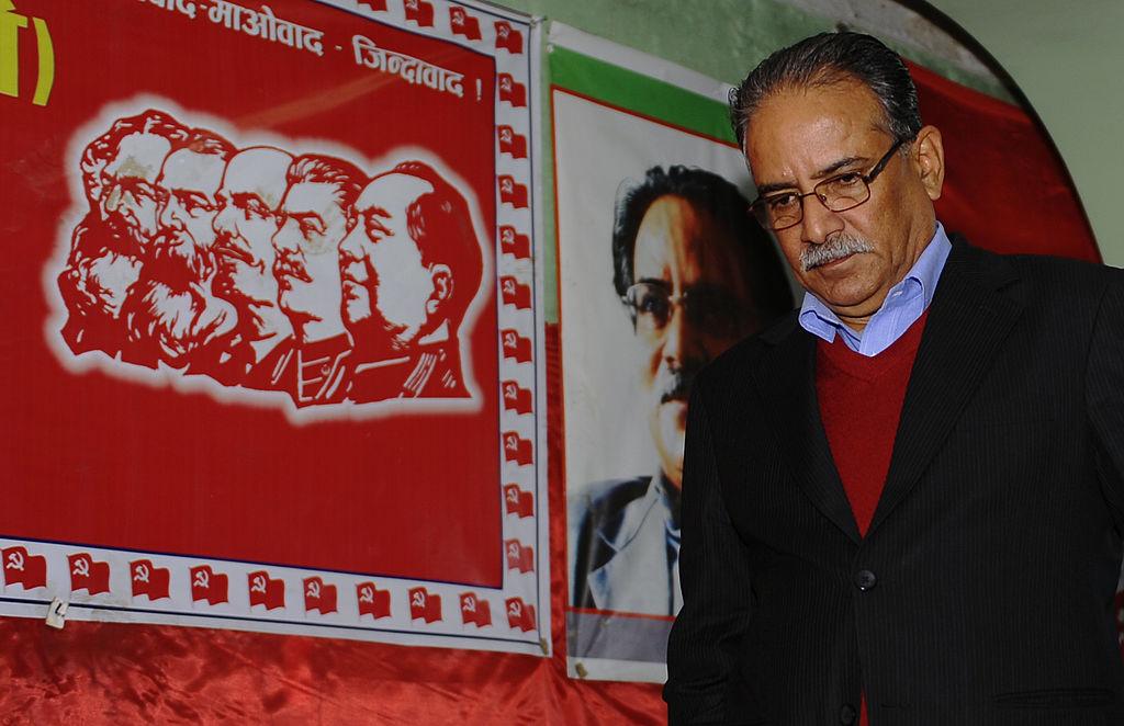 Unified Communist Party of Nepal (Maoist) chairman Pushpa Kamal Dahal, arrives for a press conference in Kathmandu on November 21, 2013. Nepal's former rebel leader alleged the national elections were rigged after he reportedly lost his seat, sparking fears of renewed political instability in the Himalayan nation struggling to recover from a decade-long civil war.  (Prakash Mathema/AFP via Getty Images)