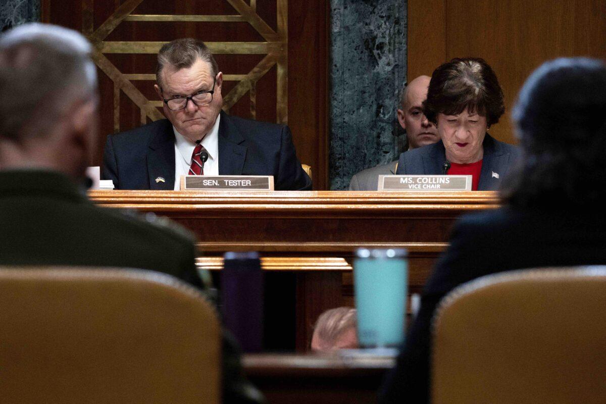 Chairman of the Senate Appropriations Committee's Subcommittee on Defense Senator Jon Tester (D-Mont.) and ranking member Senator Susan Collins (R-Maine) lead a subcommittee hearing on Capitol Hill in Washington on Feb. 9, 2023. (Jim Watson/AFP via Getty Images)