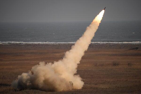 A rocket is launched from a HIMARS system during a joint French U.S. exercise involving HIMARS and MLRP rocket launchers at a firing range in Capu Midia, on the Black Sea shore, Romania, on Feb. 9, 2023. (Andreea Alexandru/AP Photo)