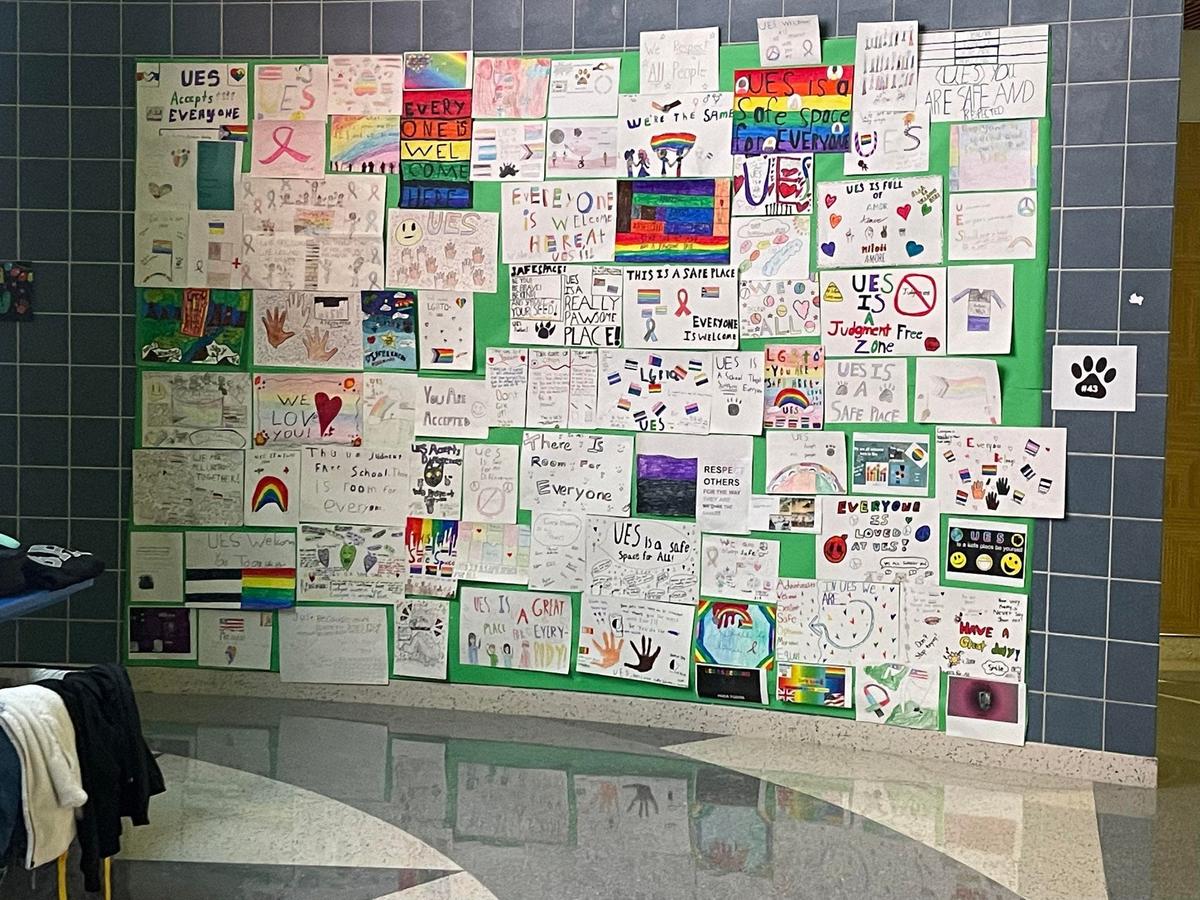 A wall of posters in the North Hanover, New Jersey's Upper Elementary School encourages children in fourth to sixth grade to accept sexual minority identities. (Photo courtesy of Angela Reading)