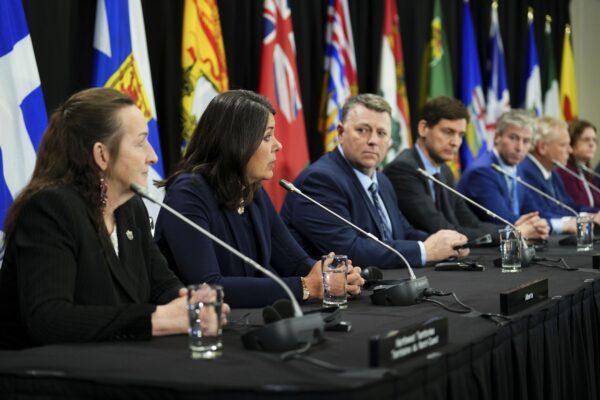 Alberta Premier Danielle Smith (2nd L) answers a question as Canada's premiers hold a press conference following a meeting on health care in Ottawa on Feb. 7, 2023. (The Canadian Press/Sean Kilpatrick)