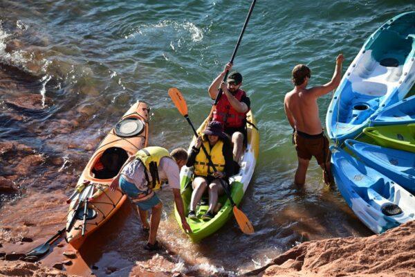 Kayakers beat the heat on Lake Powell despite low water levels, at the Antelope Point Boat Ramp in Page, Ariz., on Sept. 3, 2022. (Robyn Beck/AFP via Getty Images)