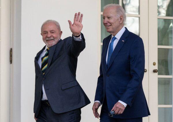 President Joe Biden and Brazilian President Luiz Inácio Lula da Silva (L) walk together along the Rose Garden colonnade at the White House on Feb. 10, 2023. (Andrew Caballero/AFP via Getty Images)
