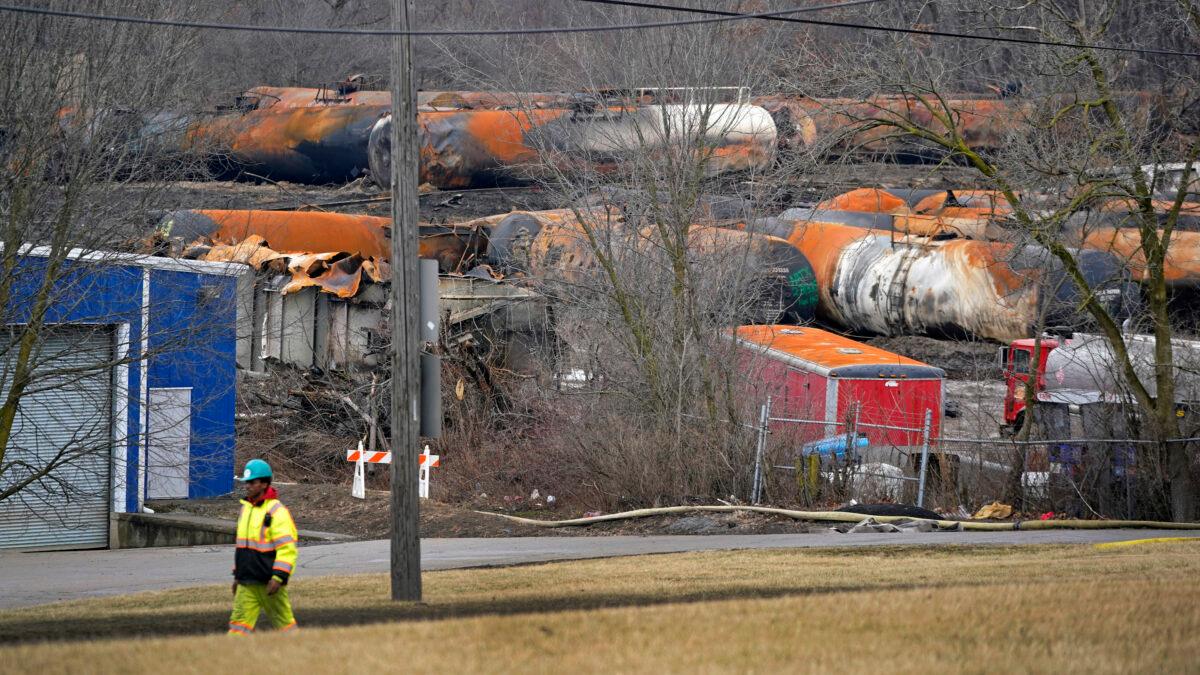 The cleanup of portions of a Norfolk Southern freight train that derailed on Feb. 3, in East Palestine, Ohio, continues on Feb. 9, 2023. (Gene J. Puskar/AP Photo)