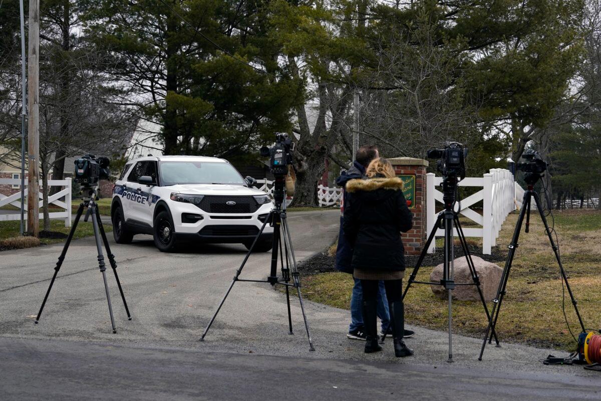 Police secure the entrance to the neighborhood of former Vice President Mike Pence's home in Carmel, Ind., on, Feb. 10, 2023. (Michael Conroy/AP Photo)