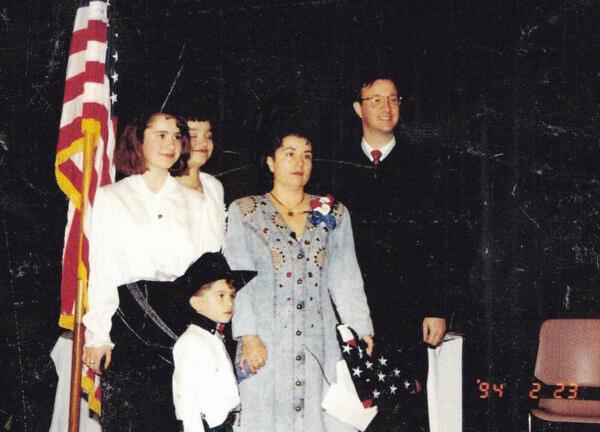 Prodan with her children during her private U.S. citizenship ceremony. Her daughters are now a counselor and an attorney, while her son is a rescue pilot for the U.S. Air Force. (Courtesy of Virginia Prodan)