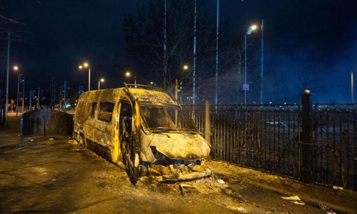 15 Arrested in Merseyside After Police Van Burned at Protest at Migrant Hotel