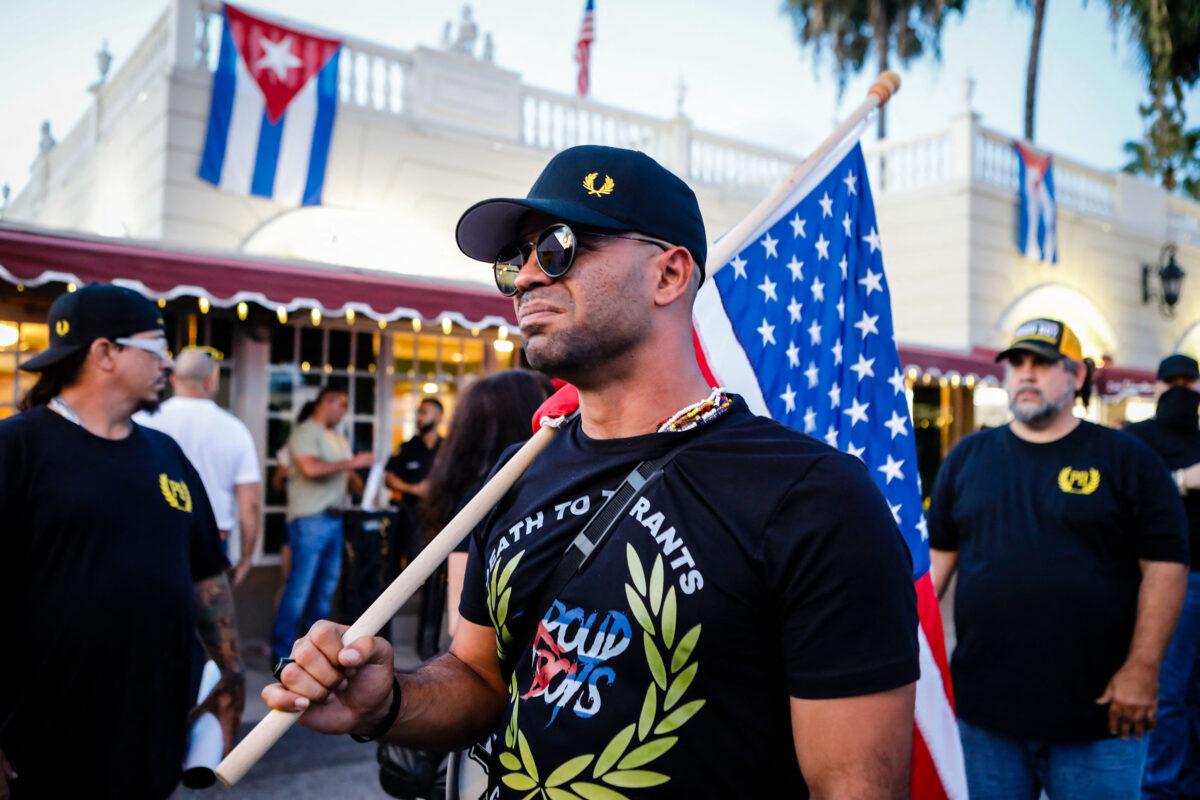 Henry “Enrique” Tarrio, then leader of The Proud Boys, holds a U.S. flag during a protest showing support for Cubans demonstrating against their government in Miami on July 16, 2021. (Eva Marie Uzcategui/AFP via Getty Images)