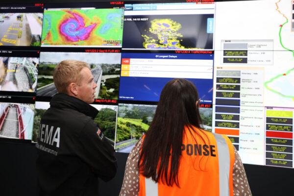 New Zealand Prime Minister Chris Hipkins is briefed ahead of Cyclone Gabrielle's arrival at Waka Kotahi Auckland Transport in Auckland, New Zealand, on Feb. 12, 2023. (Fiona Goodall/Getty Images)