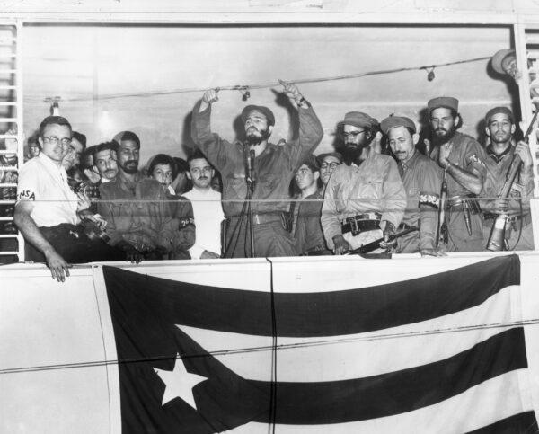 Then-Cuban President Fidel Castro speaks from a podium to the people of Camaguey, Cuba, about the "Triumph of the Cuban Revolution" against the forces of dictator Fulgencio Batista, on Jan. 4, 1959. (Photo by Hulton Archive/Getty Images)