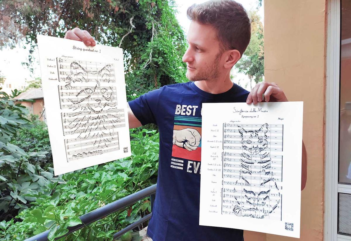 Oxman with his compositions inspired by his cats Michael and Mazie. (Courtesy of <a href="https://www.facebook.com/Sympawnies/">Noam Oxman</a>/<a href="https://www.instagram.com/sympawnies/">@sympawnies</a>/<a href="https://www.youtube.com/@Sympawnies">Sympawnies</a>)