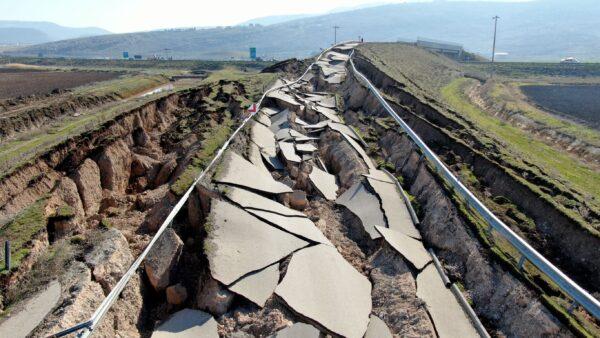 Cracks along the road near Koseli village in Pazarcik, Kahramanmaras, southern Turkey, following last week's earthquake on Feb. 12, 2023. (IHA via AP)