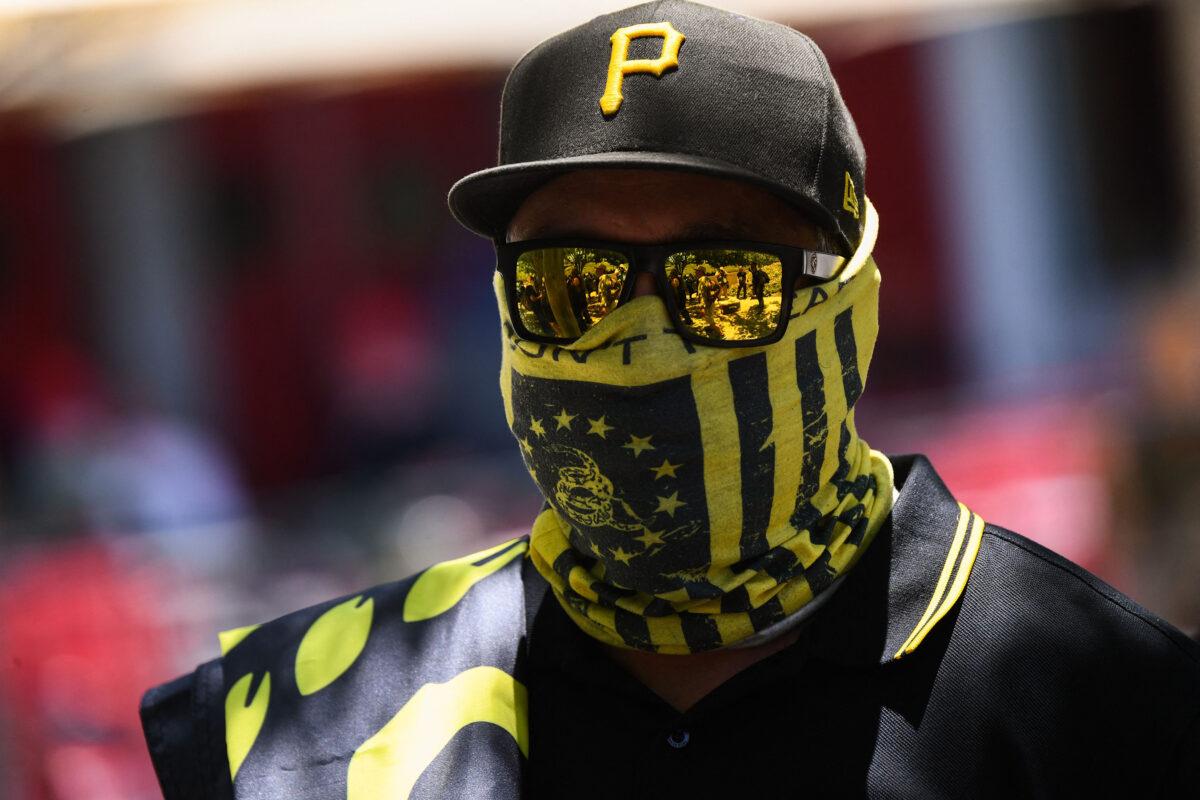 Counter-protesters wearing the yellow and black colors and insignia of the Proud Boys gather outside the National Rifle Association (NRA) Annual Meeting at the George R. Brown Convention Center in Houston, Texas, on May 28, 2022. (Patrick T. Fallon/AFP via Getty Images)