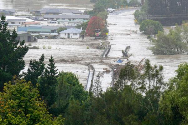An aerial photo taken on Feb. 14, 2023 shows the Waiohiki bridge and surrounds inundated by the Tutaekuri River after Cyclone Gabrielle made landfall near the city of Napier. (STR/AFP via Getty Images)