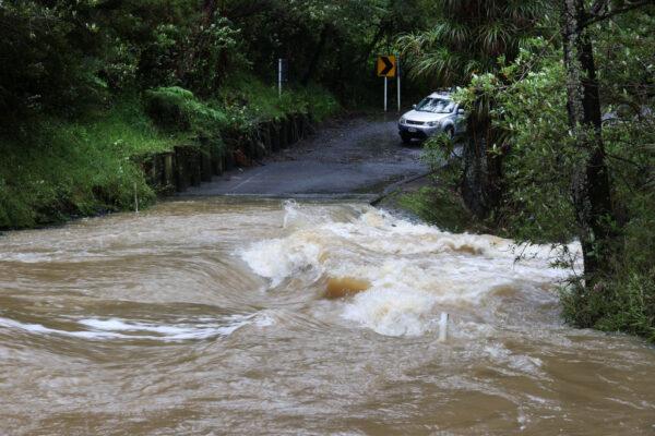 A flooded road crossing near Warkworth in Auckland, New Zealand, on Feb. 14, 2023. (Fiona Goodall/Getty Images)