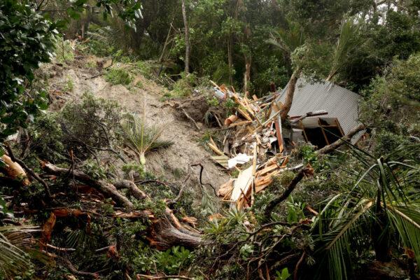 A house sits destroyed at the bottom of a large landslide on Moututara Road in Muriwai in Auckland, New Zealand, on Feb. 14, 2023. (Phil Walter/Getty Images)