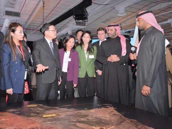 John Lee Ka-chiu (second L), Hong Kong's CEO, visiting THE LINE Experience Exhibition of NEOM Future City in Riyadh, Saudi Arabia, on Feb. 5, 2023. (Hong Kong Information Services Department)