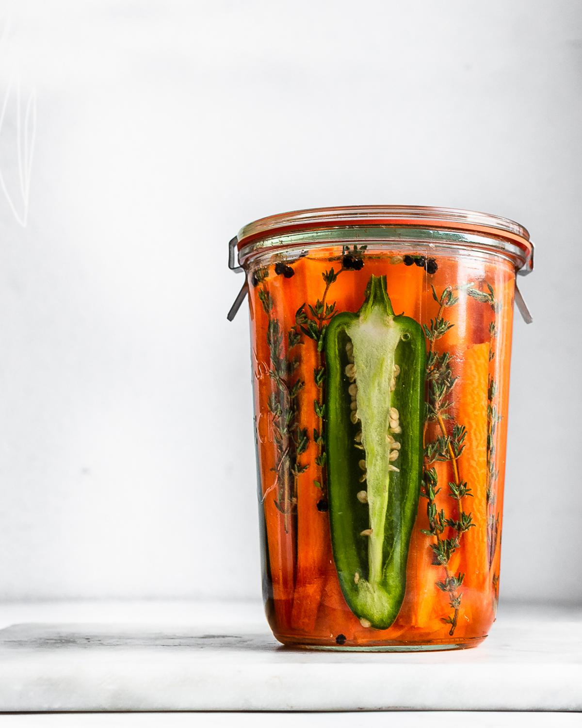 Thyme and black pepper give these fermented carrots a pleasant herbal aroma, while a single jalapeño and plenty of garlic give it a kick. (Jennifer McGruther)