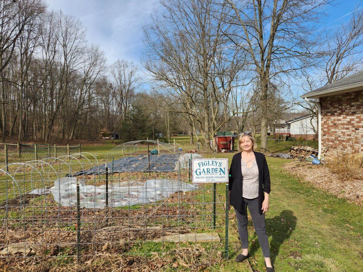 Marilyn Figley stands next to her garden on the 30-acre homestead she shares with her husband in East Palestine, Ohio, on Feb. 14, 2023. Their home is less than a mile from the site of the Norfolk Southern train derailment. (Jeff Louderback/The Epoch Times)