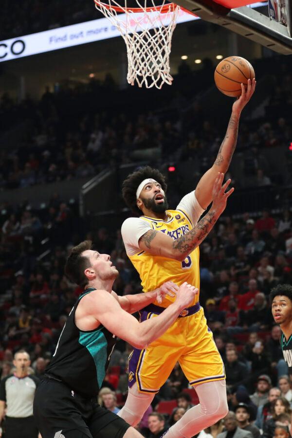 Anthony Davis (3) of the Los Angeles Lakers drives to the basket as Drew Eubanks #24 of the Portland Trail Blazers defends during the first quarter at Moda Center in Portland, on Feb. 13, 2023. (Amanda Loman/Getty Images)