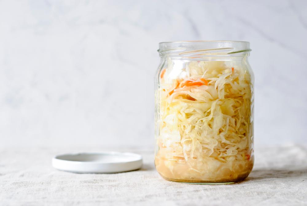 Making sauerkraut at home is marvelously easy, requiring only cabbage, salt, and a mason jar. (Sergii Gnatiuk/Shutterstock)