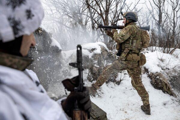Bohdan, "Fritz", the deputy of commander of the unit in 79th Air Assault Brigade, fires a rocket-propelled grenade (RPG) towards Russian positions on a frontline near the town of Marinka, Donetsk region, Ukraine, on Feb. 14, 2023. (Marko Djurica/Reuters)