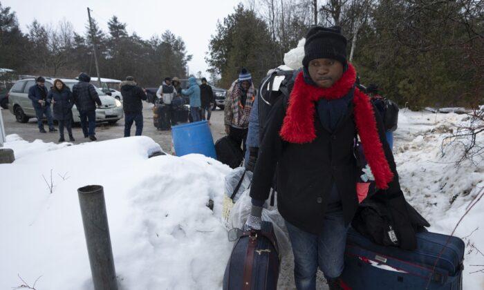 Ottawa Paying to Move Roxham Road Migrants from Quebec to Other Provinces