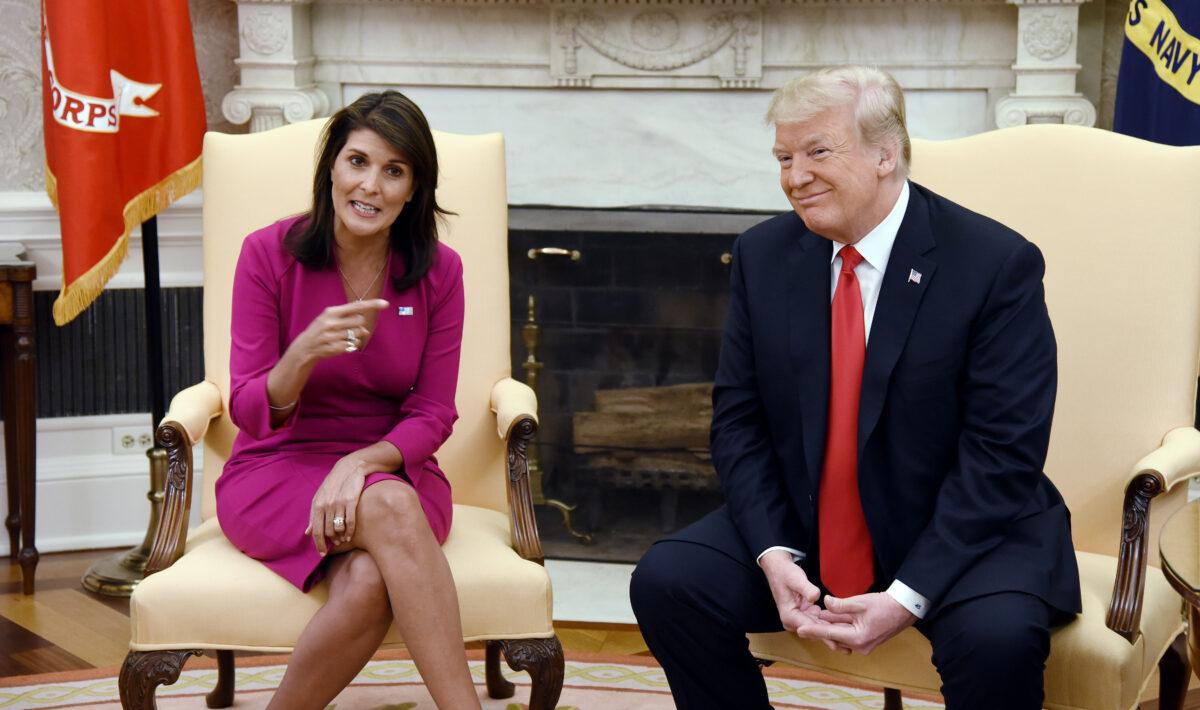 Then-President Donald Trump meets with Nikki Haley, the then-U.S. ambassador to the United Nations, in the Oval Office of the White House in a file photo. (Olivier Douliery/AFP via Getty Images)