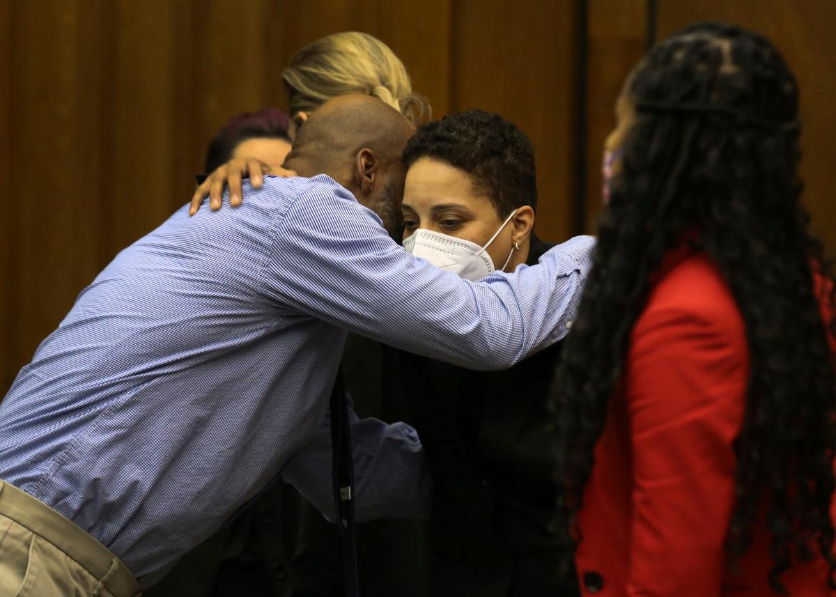 Lamar Johnson (L) embraces St. Louis Prosecutor Kim Garner after St. Louis Circuit Judge David Mason vacated his murder conviction during a hearing in St. Louis on Feb. 14, 2023. (Christian Gooden/St. Louis Post-Dispatch via AP, Pool)