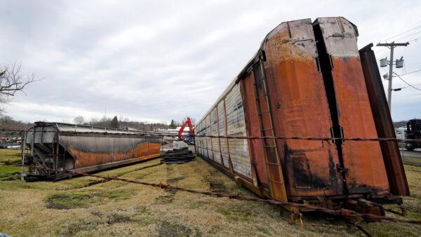 Some of the derailed Norfolk Southern freight train cars in the process of being cleaned up in East Palestine, Ohio, on Feb. 9, 2023. (Gene J. Puskar/AP Photo)