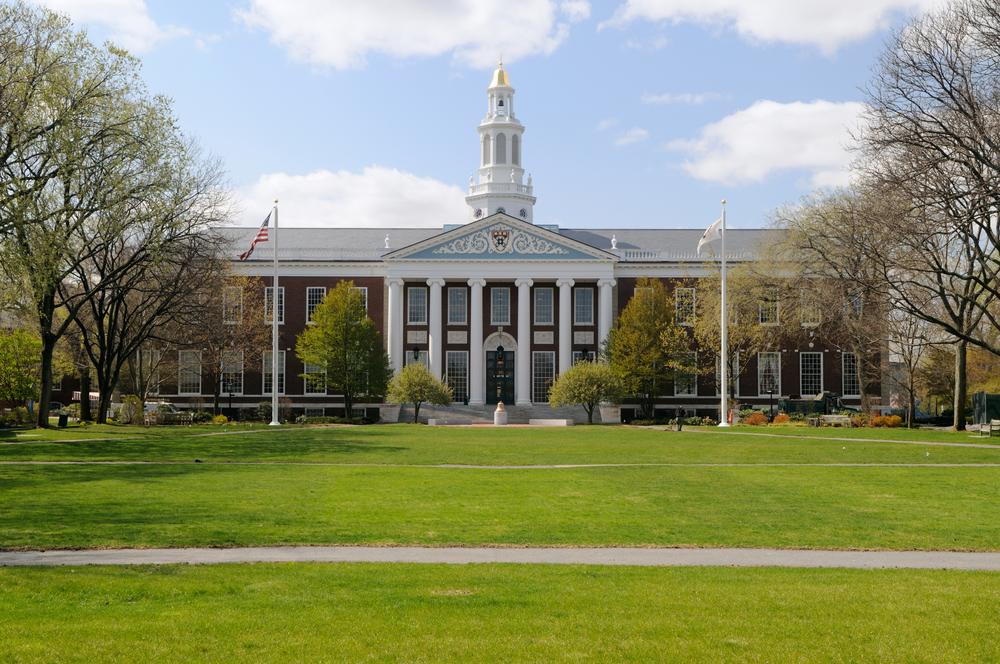 Colleges are dotted with buildings that honor their benefactors, such as this building donated to Harvard Business School by George F. Baker. (Jorge Salcedo/Shutterstock)