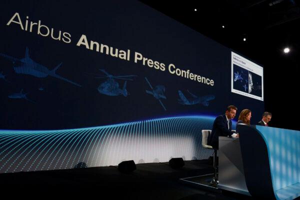 Airbus Chief Executive Officer Guillaume Faury (L) head of Airbus Communications and Corporate Affair Julie Kitcher (C) and Airbus CFO Dominik Asam attend Airbus' Annual Press Conference in Toulouse, southwestern France, on Feb. 16, 2023. (Frederic Scheiber/AP Photo)