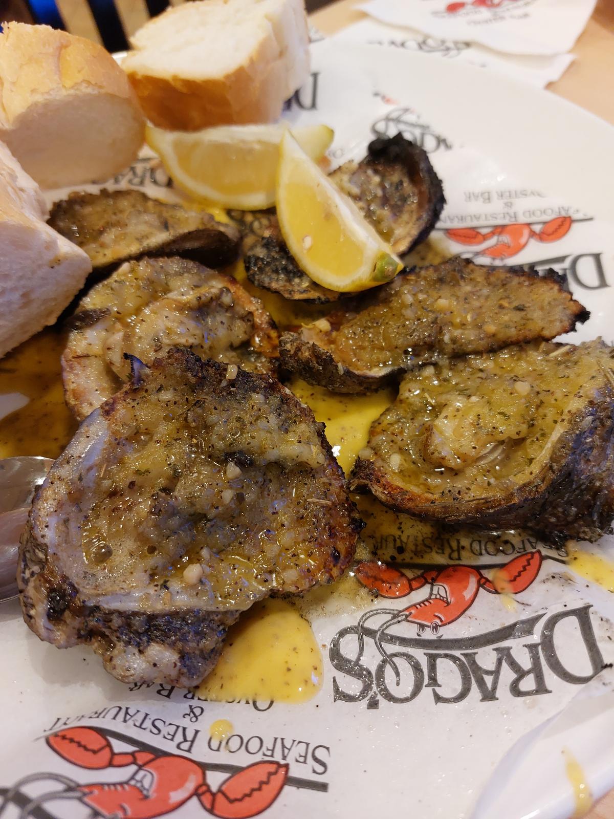 Charbroiled oysters at Drago's. (Kevin Revolinski)