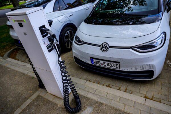 A Volkswagen electric car is parked in front of a charging station in Salzgitter, north-central Germany, on May 18, 2022. (John Macdougall/AFP via Getty Images)