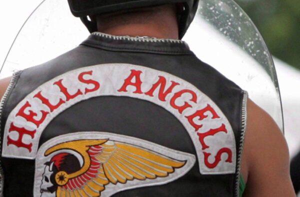 Members of the Hells Angels arrive at a property in Langley, B.C., on July 25, 2008. (The Canadian Press/Darryl Dyck)