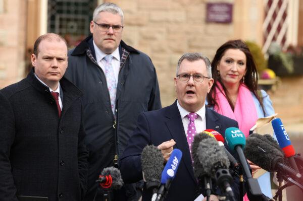 (L) Gordon Lyons MLA, Gavin Robinson MP, Sir Jeffrey Donaldson MP, and Emma Little-Pengelly MLA speak to the media outside the Culloden Hotel in Belfast on Feb. 17, 2023. (PA Media)