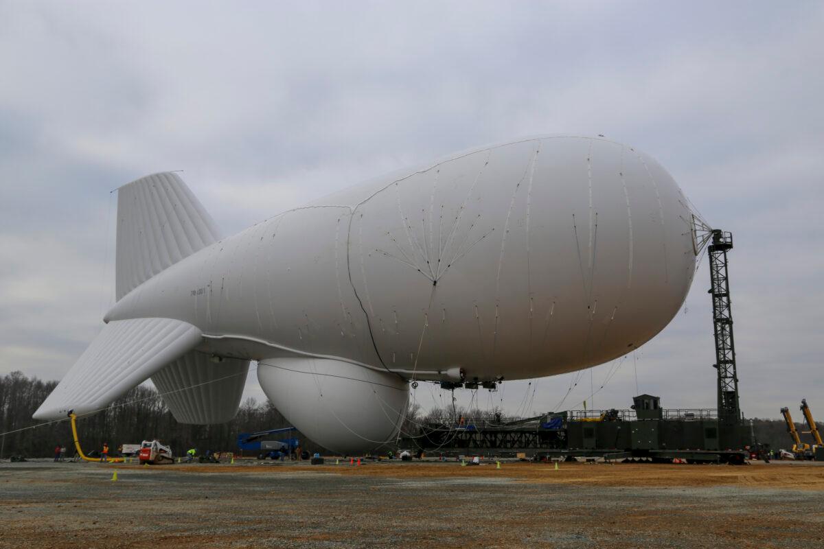 Joint Land Attack Cruise Missile Defense Elevated Netted Sensor System (JLENS) personnel oversee the inflation of an aerostat at Aberdeen Proving Ground, Md., on Dec. 15, 2014. (U.S. Army Photo by Sgt. Ronald Sellinger /Released)