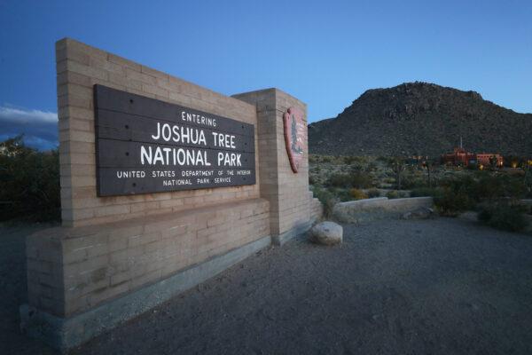 A sign marks an entrance to Joshua Tree National Park on May 18, 2020, in Joshua Tree National Park, California. (Mario Tama/Getty Images/TNS)