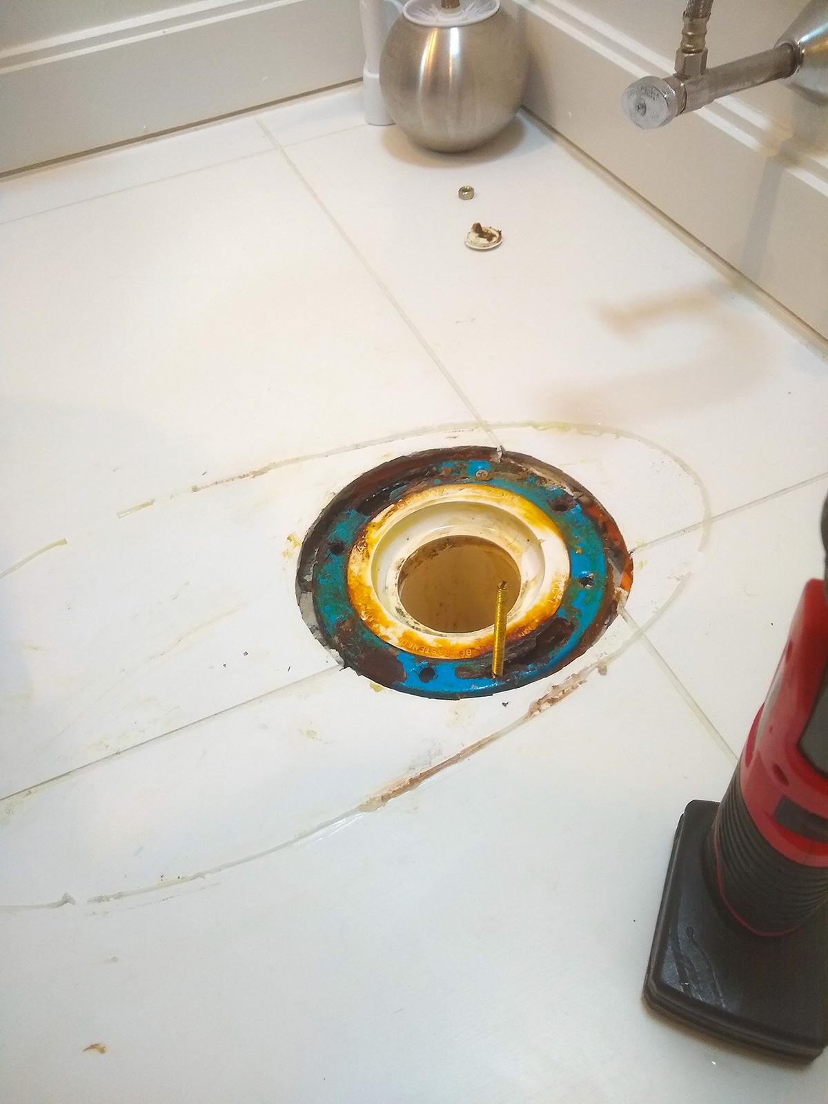 New flooring installed over old can bury a toilet flange, as pictured here. Don't assume that your flooring contractor knows how to reseat a toilet after a job like this. (Tim Carter/Tribune Content Agency/TNS)