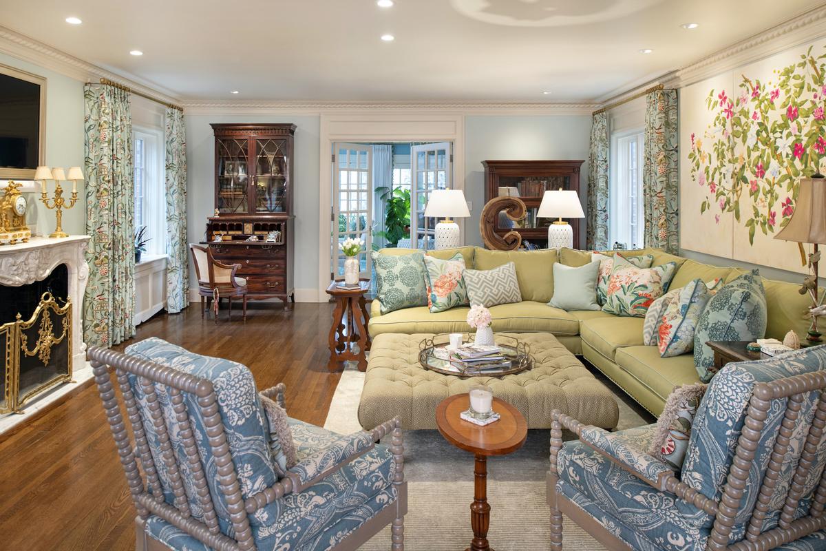 A colorful sofa is the anchor of the living room design, in which blues and greens reign supreme. (Handout/TNS)