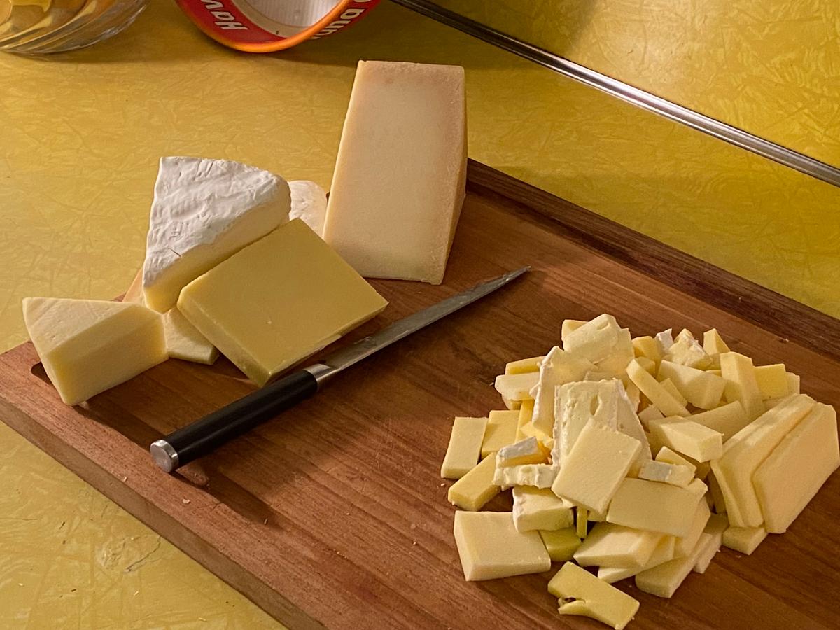 Choosing your own cheeses is what can make this the perfect macaroni for you—here, we have sharp cheddar, nutty Comté, melty-rich Fontina and Camembert for additional velvety texture and intense flavor. (Bethany Jean Clement/The Seattle Times/TNS)